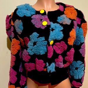 Black sweater with multi color flowers